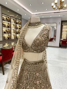 Are you ready to be a blushing bride? Bridal Lehenga BL-014 is the perfect pick to bring your wedding dreams to life! This elegant lehenga is designed to make you look like a party-popper, ensuring you're the star of the show! Join the wedding brigade in style and be the 'belle of the ball'! 💃 Fabric: Organza WASH CARE INSTRUCTIONS - Please Dry clean only when it is applicable Ready to Ship! Kundan Sharara For Wedding, Festive Hand Embellished Wedding Dress, Bollywood Style Floor-length Hand Embellished Wedding Dress, Anarkali Wedding Dress Hand Embellished, Elegant Designer Tilla Sharara, Designer Bollywood Choli With Tilla Detailing, Bollywood Style Designer Choli With Tilla, Festive Reception Sets With Tilla Details, Festive Designer Anarkali Wedding Dress