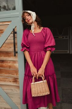 Our best-selling Lani Dress is BACK! She's a playful and versatile addition to any wardrobe. This modest women's dress features a beautiful berry-colored 100% cotton fabric and a square neckline, along with 3/4 length balloon sleeves and a midi-length skirt. The pull-over style with a smocked bodice makes it easy to wear and breastfeeding and maternity-friendly. And with its fully lined design, you'll feel comfortable and confident all day (and all year) long! Thanksgiving Dress, Girls Holiday Dresses, City Woman, White Dress Party, Holiday Party Dresses, Midi Length Skirts, Tier Skirt, Everyday Dresses, Girls Rompers