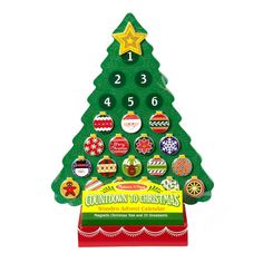 a wooden christmas tree with buttons on it's side and numbers in the middle