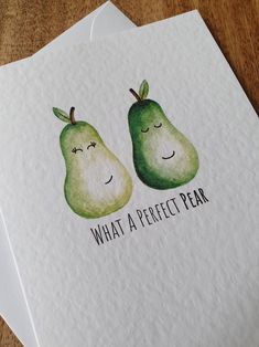 two pears with the words what a perfect pear written on them are drawn in black ink