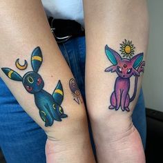 two people with matching tattoos on their arms, one has a cat and the other has a dog