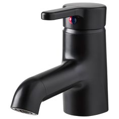 a black faucet with red eyes on it