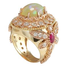 Stamped: 14K Yellow GoldTotal Ring Weight: 17.7 GramsRing Length: N/ARing Width: N/AGemstone Weight: Total Natural Opal Weight is 3.82 Carat (Measures: 14.79x11.66 mm)Color: MulticolorGemstone Weight: Total Natural Ruby Weight is 1.24 CaratColor: RedDiamond Weight: Total Natural Diamond Weight is 2.65 CaratColor: F-G, Clarity: VS2-SI1Face Measures: 26.50x23.60 mmSku: [704156W] Luxury Yellow Gold Opal Ring, Luxury Gold Opal Ring Hallmarked, Luxury Gold Opal Ring, Luxury Gold Opal Ring With Cabochon, Luxury Multi-stone Gold Ruby Ring, Luxury Multi-stone Ruby Ring In Gold, Luxury Gold Ruby Ring With Multi-stone, Luxury Gold Multi-stone Opal Ring, Luxury Multi-stone Rose Gold Ring