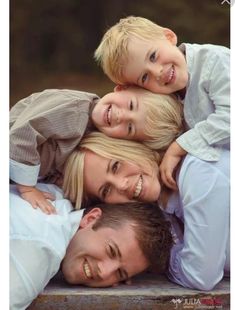 the family is posing for a photo together