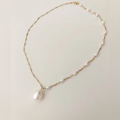 The Asymmetrical Baroque Freshwater Pearl Pendant Necklace Is Composed Of 4mm Freshwater Rice Pearls Separated By 14k Gold Filled Bars. Designed To Be Asymmetrical, Tiny Freshwater Rice Pearls Are Featured On One Side, Leading The Way Into A Matching Drop With A Focal Baroque Pearl Pendant. Handmade. Never Worn. Brand New. Baroque Pearl Pendant, Elizabeth Jewelry, Rice Pearls, Beads Craft Jewelry, Beads Craft, Dope Jewelry, Pendent Necklace, Freshwater Pearl Necklace, Craft Jewelry