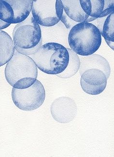 blue and white watercolors on paper with circles in the middle, overlayed