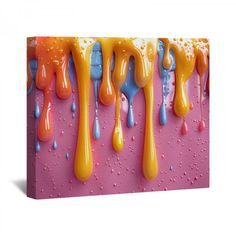 an abstract painting with yellow, blue and orange drips on a pink background canvas wall art print