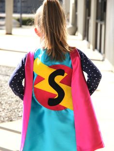 "This one-of-a-kind bright and colorful personalized superhero cape comes double sided with an outside color and contrasting inside color! Our superhero capes are great for so many occasions! Superkid Capes loves to celebrate and encourage! Choose from many combinations! See the options below, then let us know your special hero's initial to add to this cape! INCLUDES: ONE Personalized superhero cape, customized with child's initial Choose an option (You will choose the # at checkout. See picture Super Hero Capes For Kids, Purple Cape, Purple Gloves, Superhero Cape, Pink Cape, Green Gloves, Color Sheets, Capes For Kids, Cape Designs