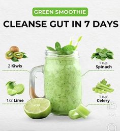 the green smoothie is in a mason jar with ingredients to make it look like it has