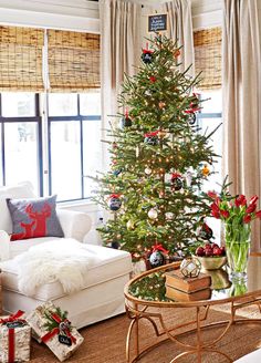 a decorated christmas tree in a living room