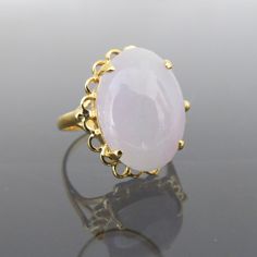 Vintage 18K Solid Yellow Gold Translucent Oval Natural Light Lavender Jadeite Jade Ring....Marked 18k ...Total of weights 4.9grams...Size 7.25..Measure of Jade 18 x 13MMIt's in very good condition.  #461958 Lavender Jade Jewelry, Formal Oval Kunzite Rings, Formal Pink Oval Opal Ring, Oval Kunzite Ring For Anniversary, Fine Jewelry Oval Kunzite Rings, Lavender Jade, Vintage Bangle Bracelets, Light Lavender, Buddha Pendant