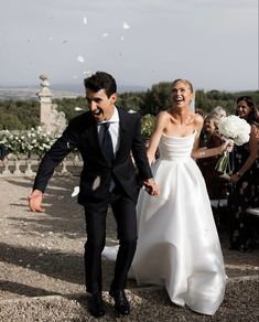 a newly married couple walking down the aisle