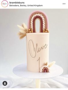 there is a cake that has been decorated with a bag and the word love on it