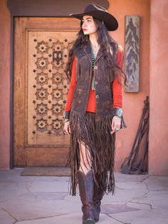 I love a great vest! This is a great finish to any western outfit. Our Whiskey Jessie Fringe vest was created with careful placement of fringe and pockets. Loaded with hand stitching, our Italian leather has and amazing attention to detail. Fun to wear, and a true Wild West Statement! Fine distressed Italian leather in camel's, taupe's and chocolate. We do stock inventory, but please allow 4 weeks, if we are in production, contact if you are in a rush. We can change arm length, but do not divert Sleeveless Western Outerwear For Fall, Western Style Denim Vest For Fall, Fitted Vest For Western-themed Events In Fall, Brown Fringe Vest For Festival, Festival Fringe Brown Vest, Fall Festival Vest With Fringe, Brown Fringe Vest For Fall, Fitted Fringe Vest For Festivals, Bohemian Brown Vest With Fringe