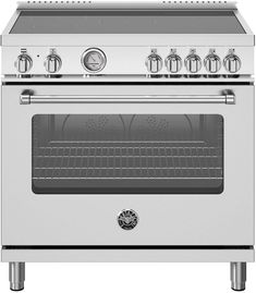 a white stove with four burners and two oven doors on each side, in front of a white background