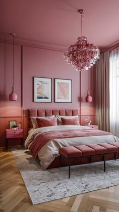 a bedroom with pink walls and furniture in the corner, including a bed that has a bench underneath it