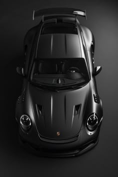 a black sports car is shown from above