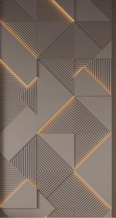 a wall with some lights on it in the shape of an abstract pattern and lines