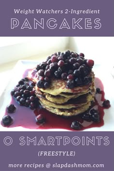 pancakes with blueberries on top and syrup drizzled over them, in front of the words weight watchers 2 ingredient pancakes