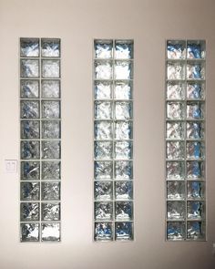 three glass block windows in a white room