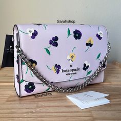 100% Authentic Brand New With Tags Kb497 Carson Convertible Crossbody Pansy Toss Printed Multi And Silver Hardware 9" X 6" X 2.5" Chain Handle Is 5” Drop (Not Removable) Long Shoulder Strap Included Space Flowers, Cross Shoulder Bags, Purple Purse, Large Crossbody Bags, Brown Crossbody Bag, Glitter Gifts, Kate Spade Bag Crossbody