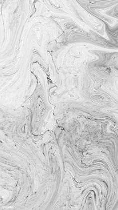 an abstract marble background with white and gray swirls on the top, as well as black