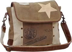 PRICES MAY VARY. {Lightweight Canvas Purse} Rugged, sturdy two tone stamped high quality canvas, leather trim, recycled Military canvas, fully lined with printed material and genuine leather accents {Perfect for Day or Weekend Trips} This women’s purse has decorative brass hardware, star leather, top zipper closure, and measures 10.5" wide by 3.5" deep by 9" high {Hand-Crafted Quality} We follow a specific process in the creation of our upcycled canvas purses and handbags which includes material Canvas Purse, Vintage Leather Bag, Canvas Messenger Bag, Vintage Star, Women Leather, Cute Bags, Canvas Shoulder Bag, Outfit Casual, Vintage Bags