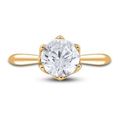 a yellow gold engagement ring with an oval cut diamond