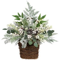 a basket filled with greenery and pine cones