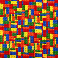 a close up of a lego pattern made out of different colored blocks and numbers on a ruler