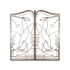 an iron gate with intricate designs on the top and bottom part, set against a white background