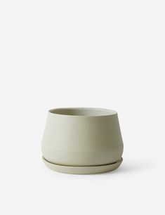 a white bowl sitting on top of a table