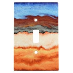 a light switch cover with an abstract painting on it