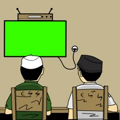 two men sitting in front of a television with green screen on it's head