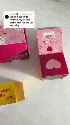 three pink boxes with hearts on them and one has a conversation bubble in the middle