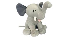 an elephant stuffed animal sitting on top of a white surface with its trunk in the air