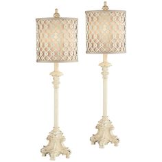 two white lamps sitting next to each other