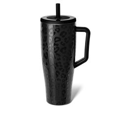 a black cup with a straw in it