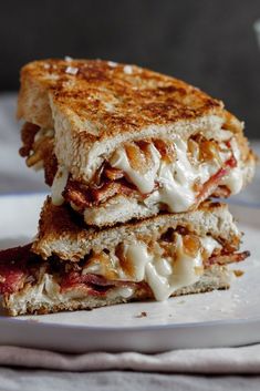 a grilled cheese and bacon sandwich on a plate