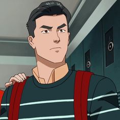 a man in a striped shirt and red backpack standing next to lockers with his hand on his shoulder