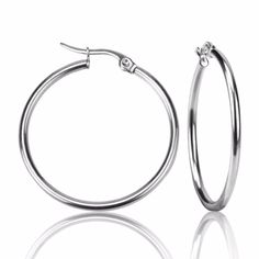 Classic silver hoop earrings. .: trendy hoop earrings.: sizes vary.: stainless steel Ready-to-Wear items are ship in approximately 7 business days. All jewelry is ship in a craft colored jewelry gift box ready for gift-giving. Have questions? See our FAQ section. If you need further assistance, please message us at customercare@alquimajewelry.com. Bracelet Viking, Hoop Earrings Style, Big Hoop Earrings, Silver Jewelry Earrings, Free Earrings, Party Earrings, Large Hoop Earrings, Earring Sale, Accessories Jewelry Earrings