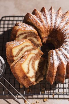 cinnamon swirl bundt cake on a cooling rack