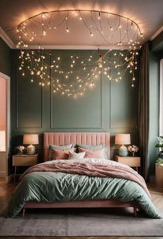 a bedroom with green walls and lights hanging from the ceiling