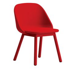 a red chair sitting on top of a white floor