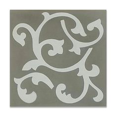 a white stencil on a gray background with an ornate design in the middle