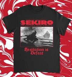 "Hesitation is Defeat" This short sleeve shirt is inspired by Hidetaka Miyazaki's "Sekiro- Shadows Die Twice". It features a large front print of the titular Sekiro (please note the short sleeve version only features one print on the front ,the back print is exclusively for the long sleeve version only). Screenprinted on Earth Positive 100% combed organic cotton T-shirts. Please note in an effort to keep postage as low as possible this shirt is shipped untracked, if you would like tracking on yo Hesitation Is Defeat, Hidetaka Miyazaki, Sekiro Shadows Die Twice, Miyazaki, Short Sleeve Shirt, Screen Printing, Sleeve Shirt, Organic Cotton, Adult Outfits