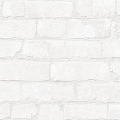 a white brick wall textured with cement