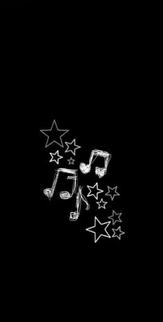 music notes and stars on a black background