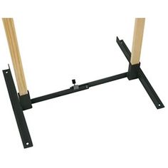 a pair of wooden poles are attached to the back end of a rack with two legs