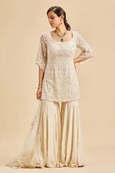 Shop for Nitika Gujral Ivory Bead And Crystal Embroidered Kurta Sharara Set for Women Online at Aza Fashions Off White Traditional Sharara With Pearl Embroidery, Traditional Off White Sharara With Pearl Embroidery, Festive Off White Sharara With Pearl Embroidery, Off White Sharara For Wedding And Eid, Off White Chikankari Embroidery Palazzo Set For Wedding, Anarkali Wedding Palazzo Set With Pearl Embroidery, Anarkali Palazzo Set With Pearl Embroidery For Wedding, Off White Palazzo Set With Chikankari Embroidery For Wedding, Off White Georgette Sharara For Wedding